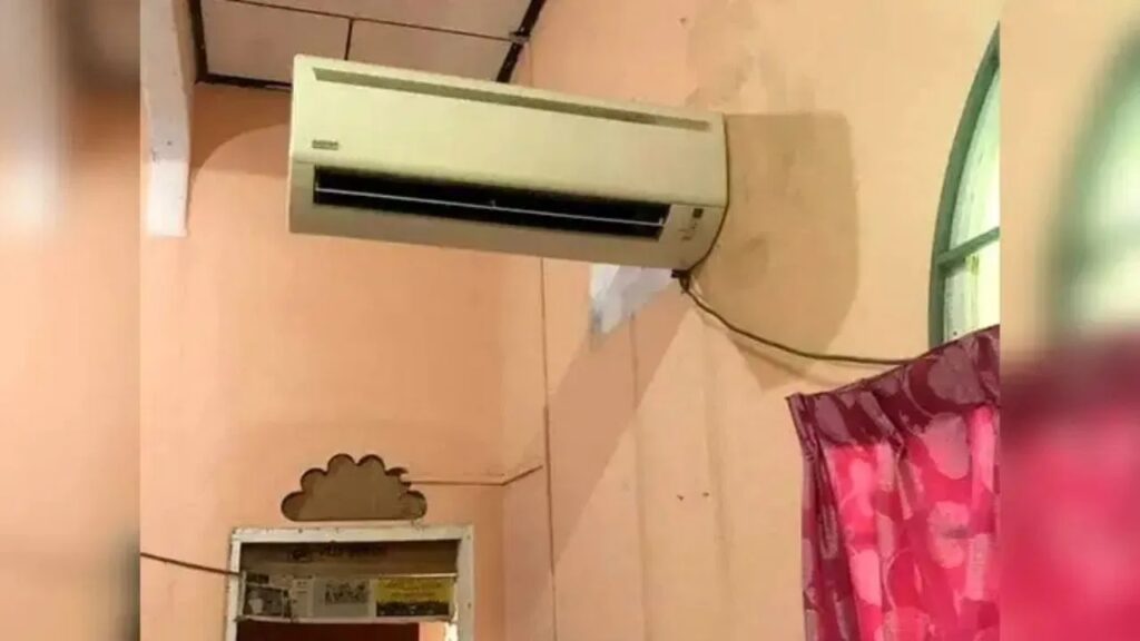 Man Set AC on Wall in Unique Style