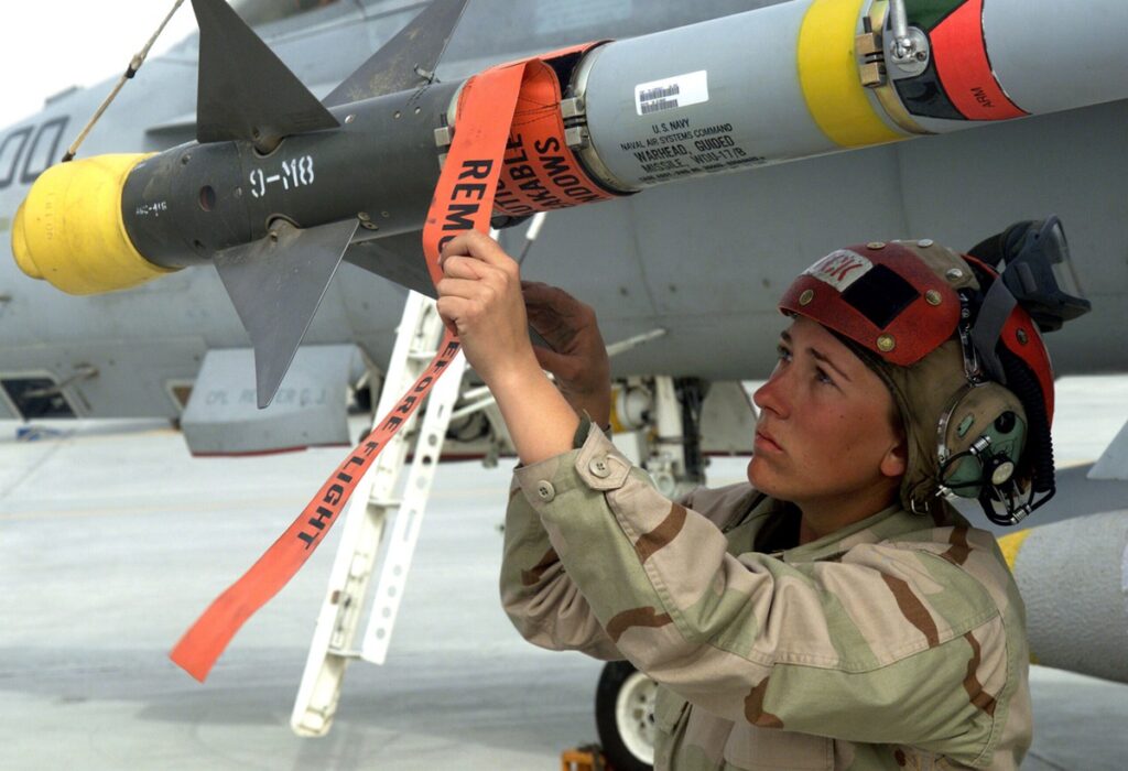 Red Tags On Fighter Jet